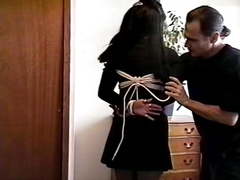 Dark?haired gal, bound and spanked by her master